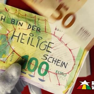 GELD+GIER+POP+REGGAE+LIED+LAMENTO+KRITIK: Dubiose Symbiose - Heiliger Schein (IT 2021)
